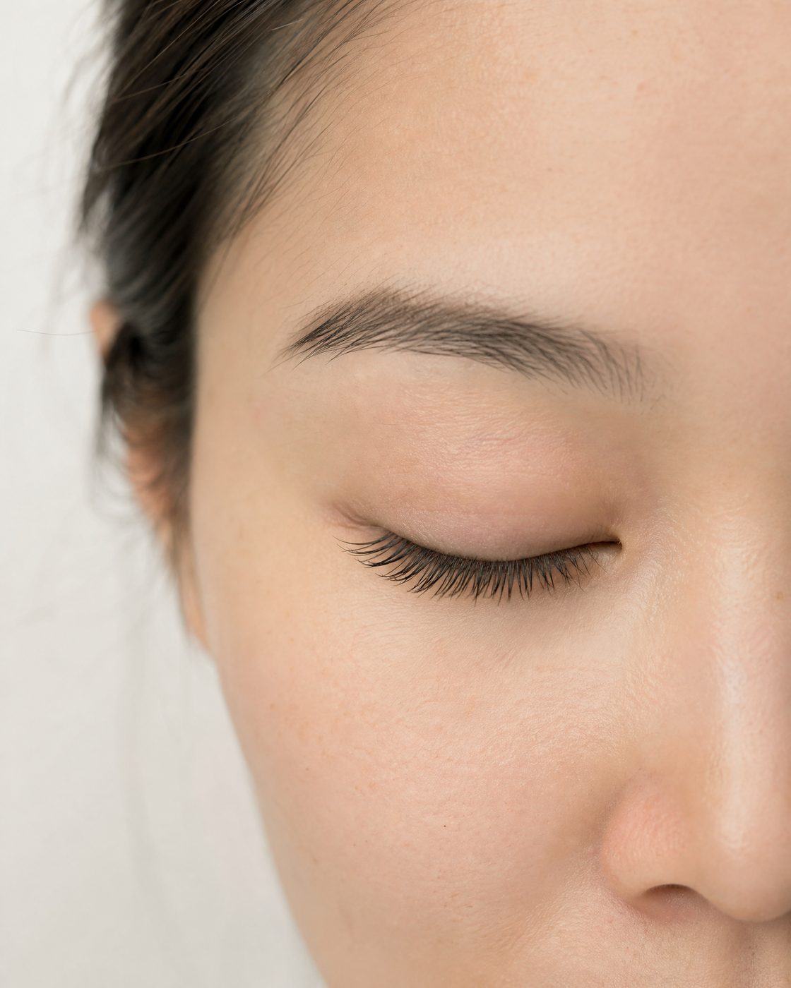 Close-up of classic lash extensions applied at VyNa